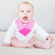 Baby girl in soft BooginHead Bandana Teether Bib in Love with pink hearts